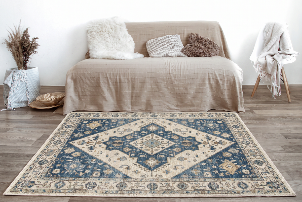 Indigo Diamond Heriz Rug, hand-tufted wool with nested ivory and indigo diamond medallions, close-up view