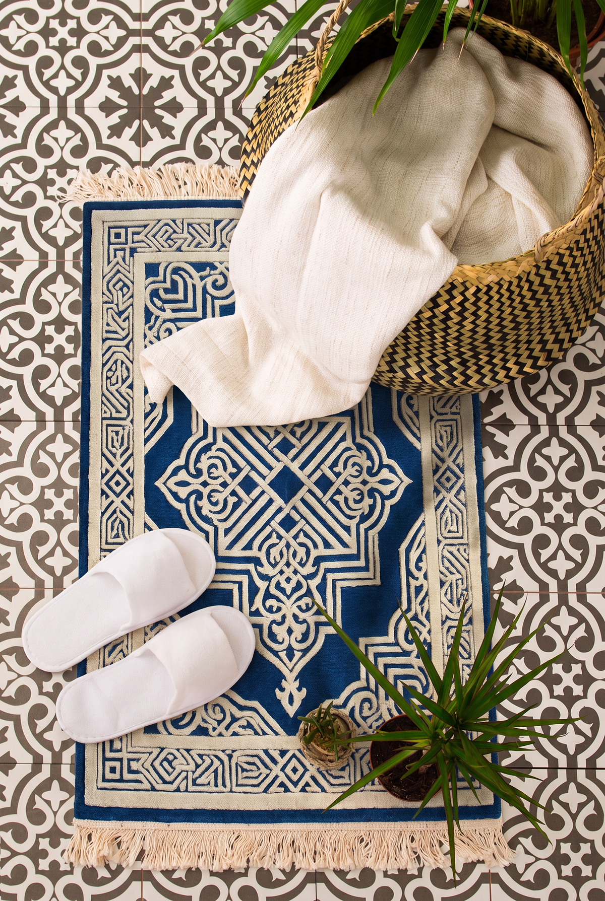 Cobalt Moorish Lattice Rug, hand-tufted wool with carved ivory lattice medallion on cobalt blue, close-up view