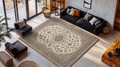 Ivory hand-tufted wool rug with an oval taupe Persian-style medallion and a taupe floral border
