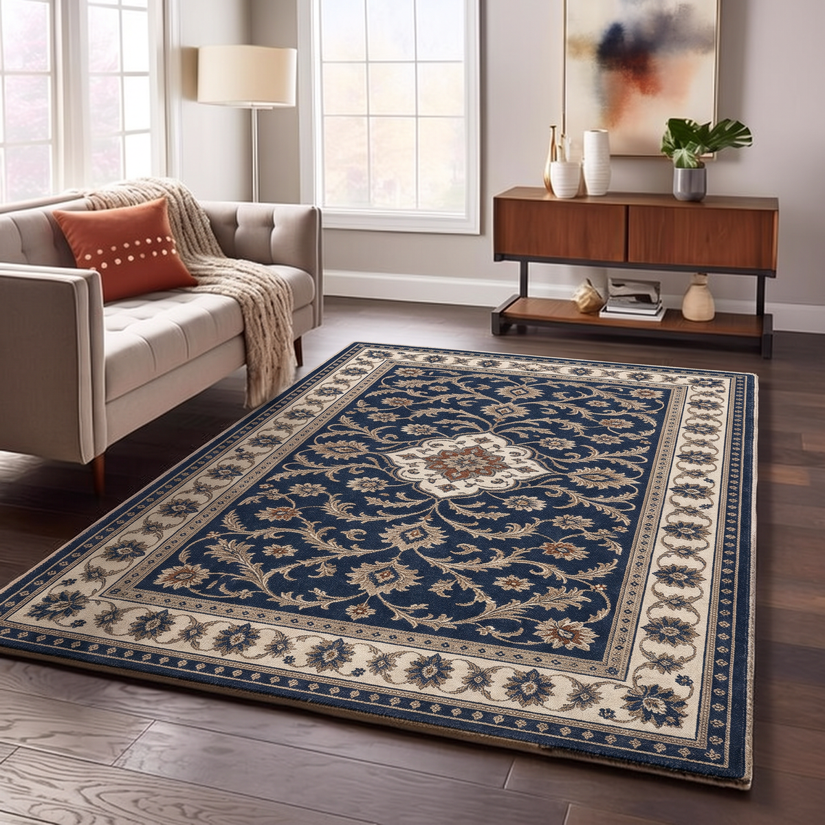 Navy hand-tufted wool rug with all-over ivory floral vines, a small centre medallion and an ivory border