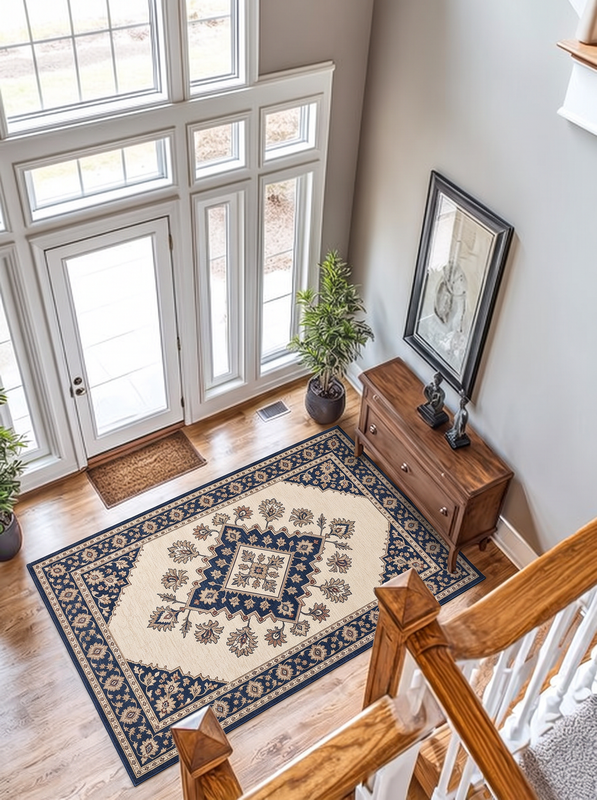 Ivory hand-tufted wool rug with a navy stepped diamond medallion and a navy geometric border