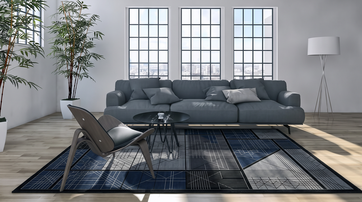 Midnight Blueprint Grid Rug, hand-knotted Indo-Nepali wool with a black grid of charcoal, grey and navy panels in fine blueprint line work, second room view
