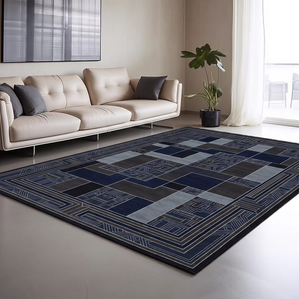 Navy Slate Framed Deco Rug, hand-knotted Indo-Nepali wool with navy, charcoal and slate colour-block panels inside a wide stepped Deco border, detail view